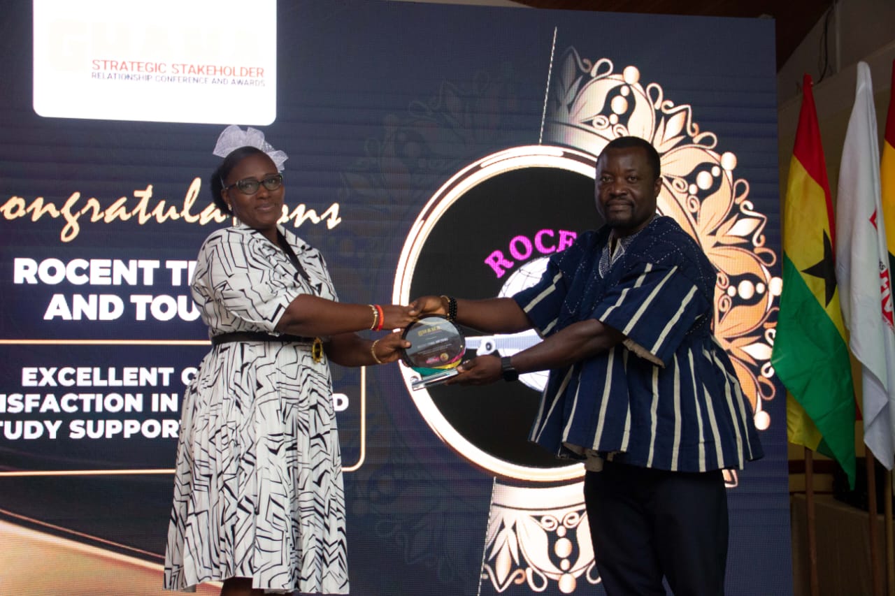Rocent Travel and Tours trophy presentation